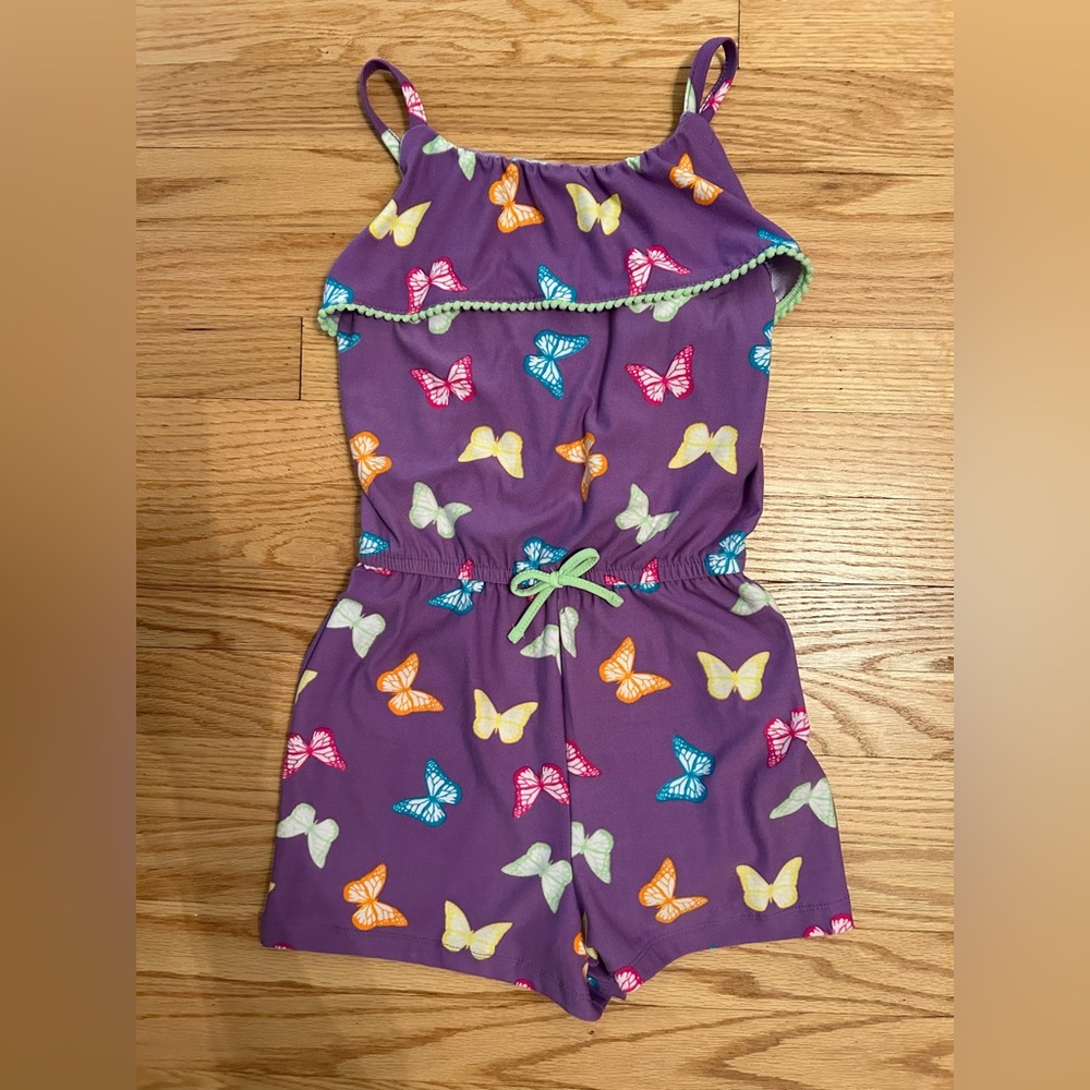 Butterfly romper bought from a boutique and never worn.